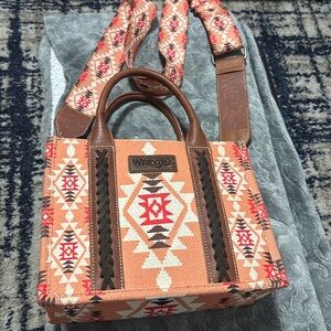 Orange wrangler purse.